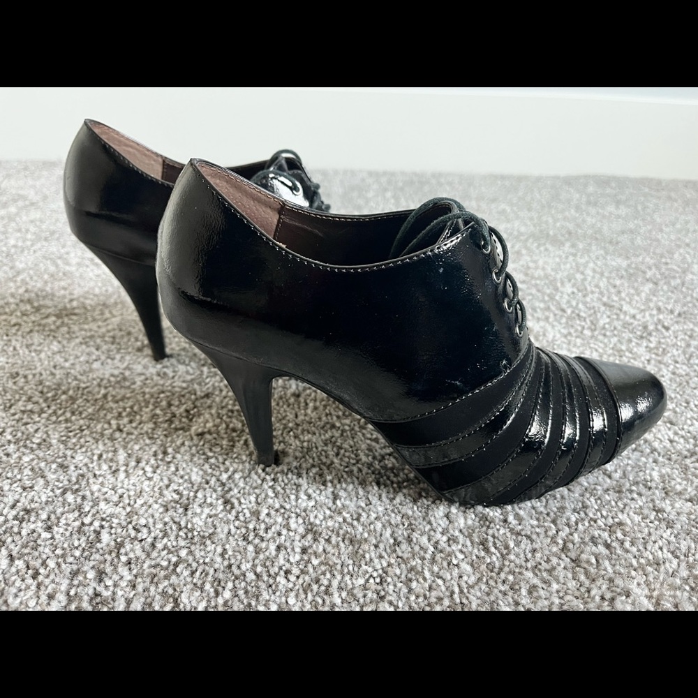 Black pencil heeled booties